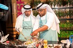 Media personalities display skills in food preparation during daily cooking competitions at “Sharjah Food Festival”